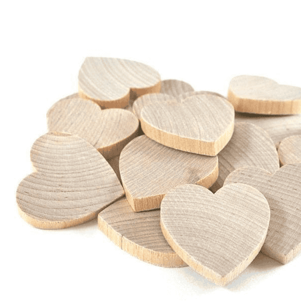Heart-shaped engraved wooden keychain for personalized gifts.