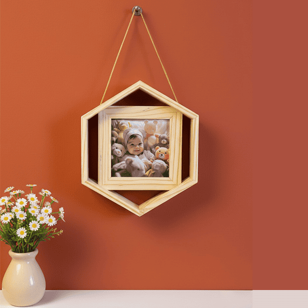 Personalized hexagonal swivel photo frame for showcasing photos creatively. Perfect for home decor a.