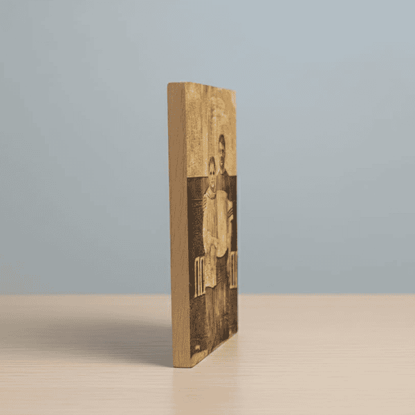 Custom laser-engraved wood photo frame with couple portrait.